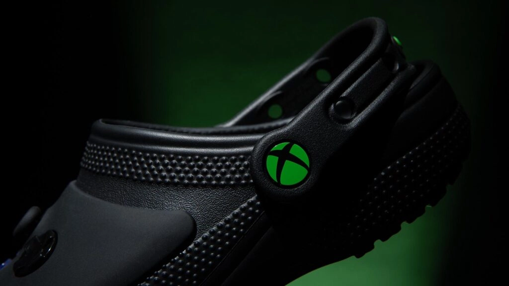 Xbox and Crocs collaborate on a unique shoe design inspired by the Xbox controller, featuring cushioned comfort.