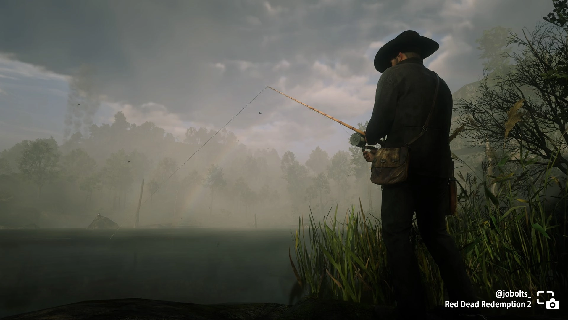 Man fishing in a misty landscape in Red Dead Redemption 2, capturing the essence of a serene side quest moment. #PSshare #...