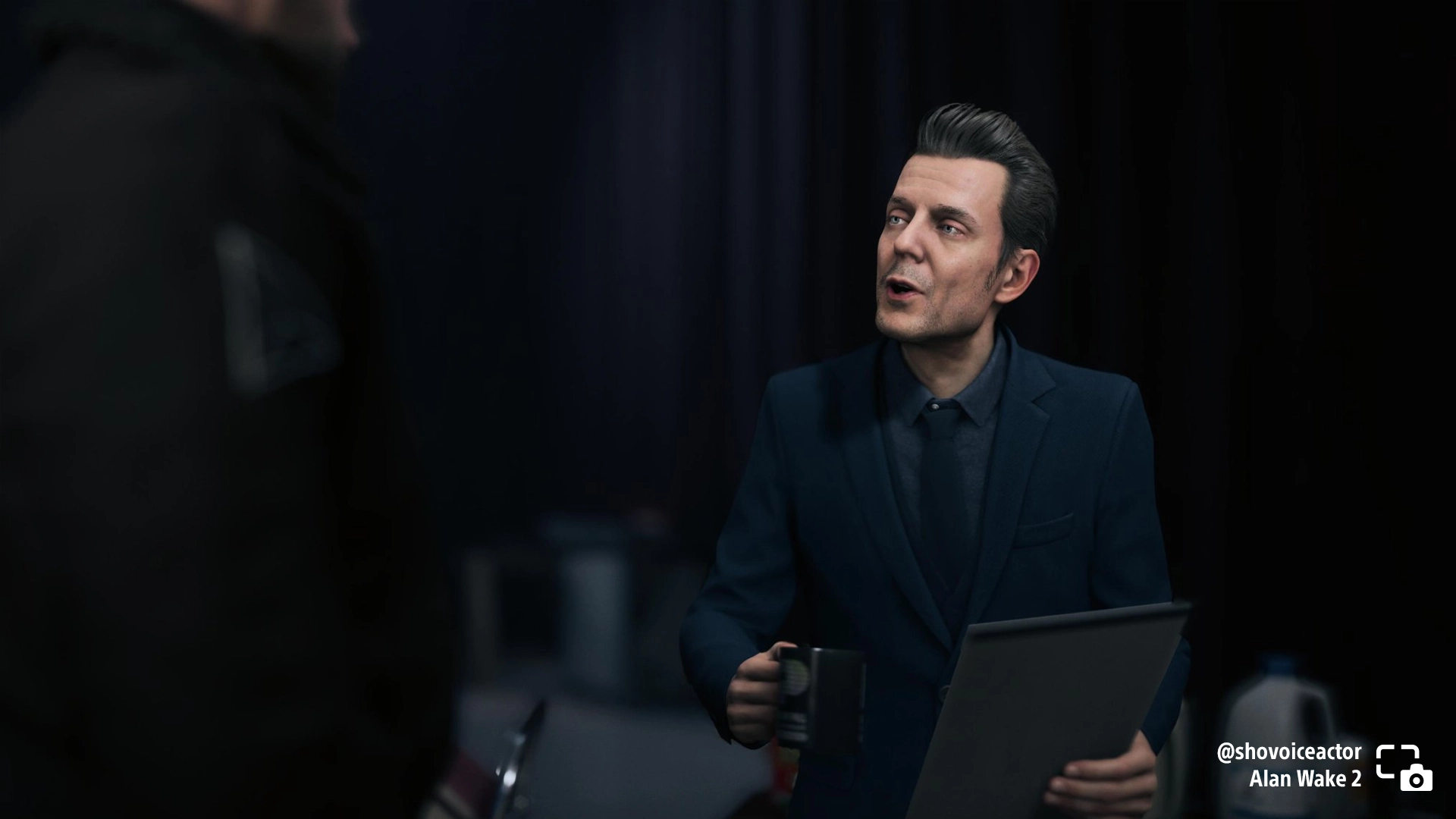 Side character Alex Casey from Alan Wake 2 engages in conversation, showcasing game