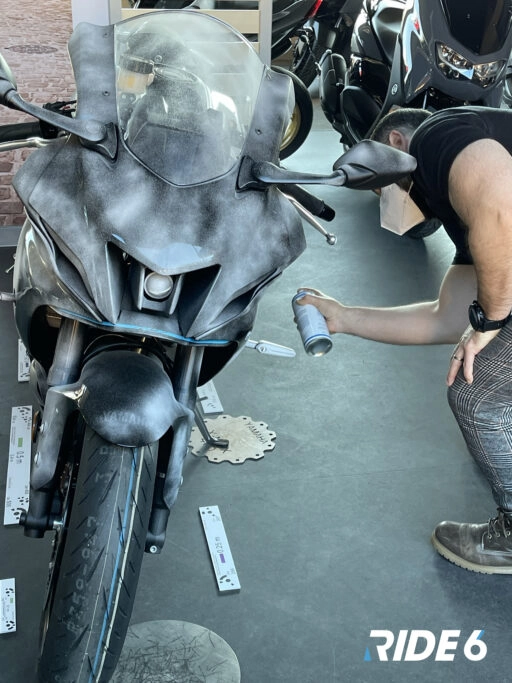 A detailed motorcycle being scanned for realistic 3D modeling in the development of Ride 6 for Xbox.