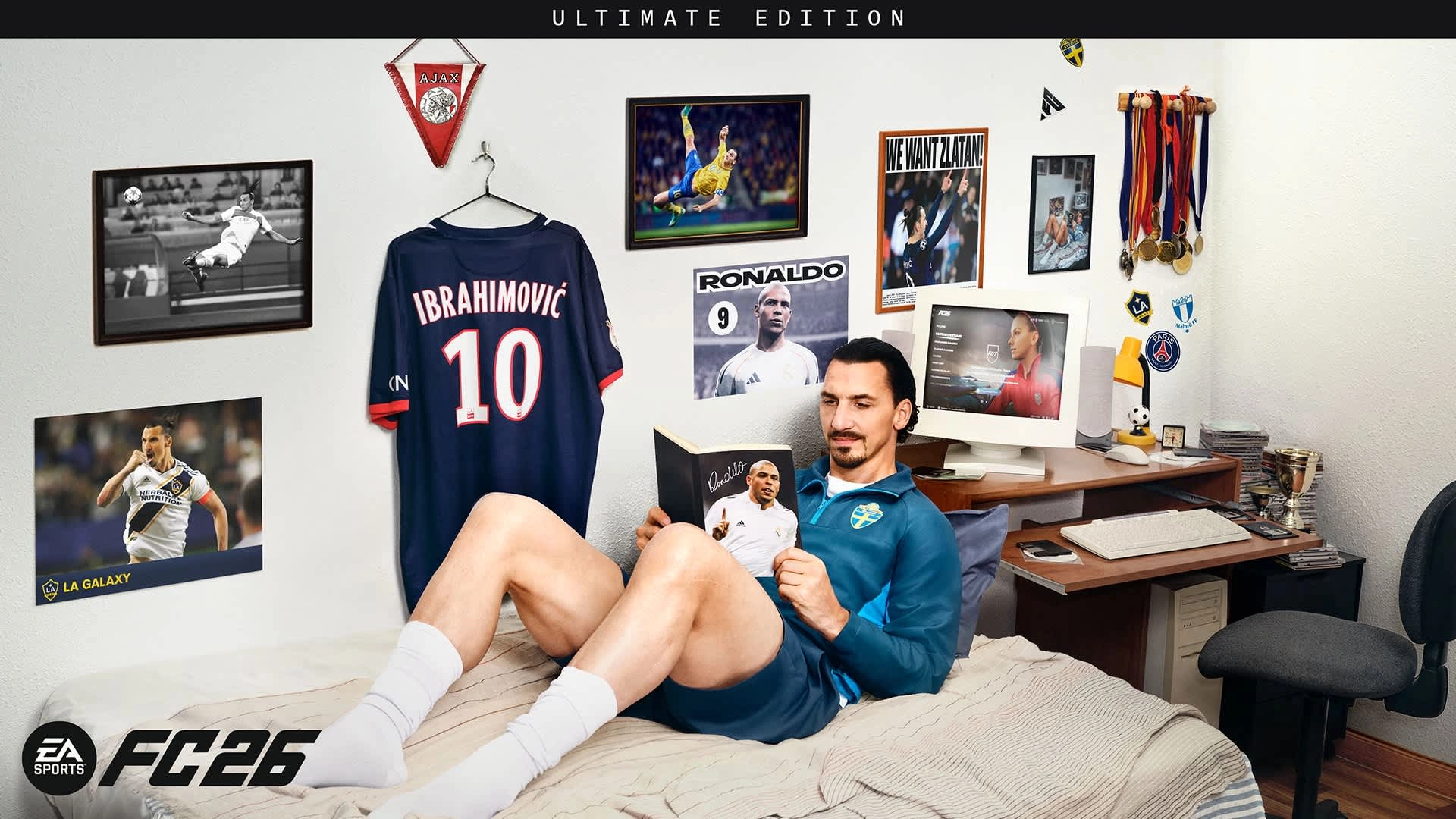 Zlatan Ibrahimović relaxes in a cozy room, showcasing EA SPORTS FC 26 Ultimate Edition and soccer memorabilia.