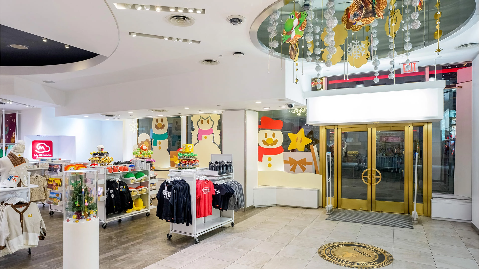 Cozy Nintendo holiday merchandise displayed in-store, featuring festive decor and exclusive winter collection items.