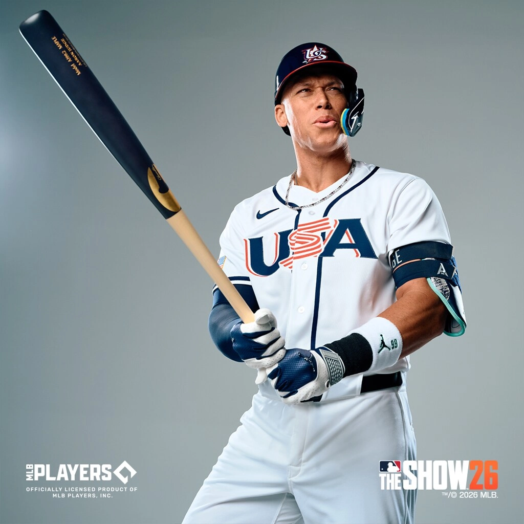 Baseball player in USA uniform holding a bat, featured on MLB The Show 26 cover
