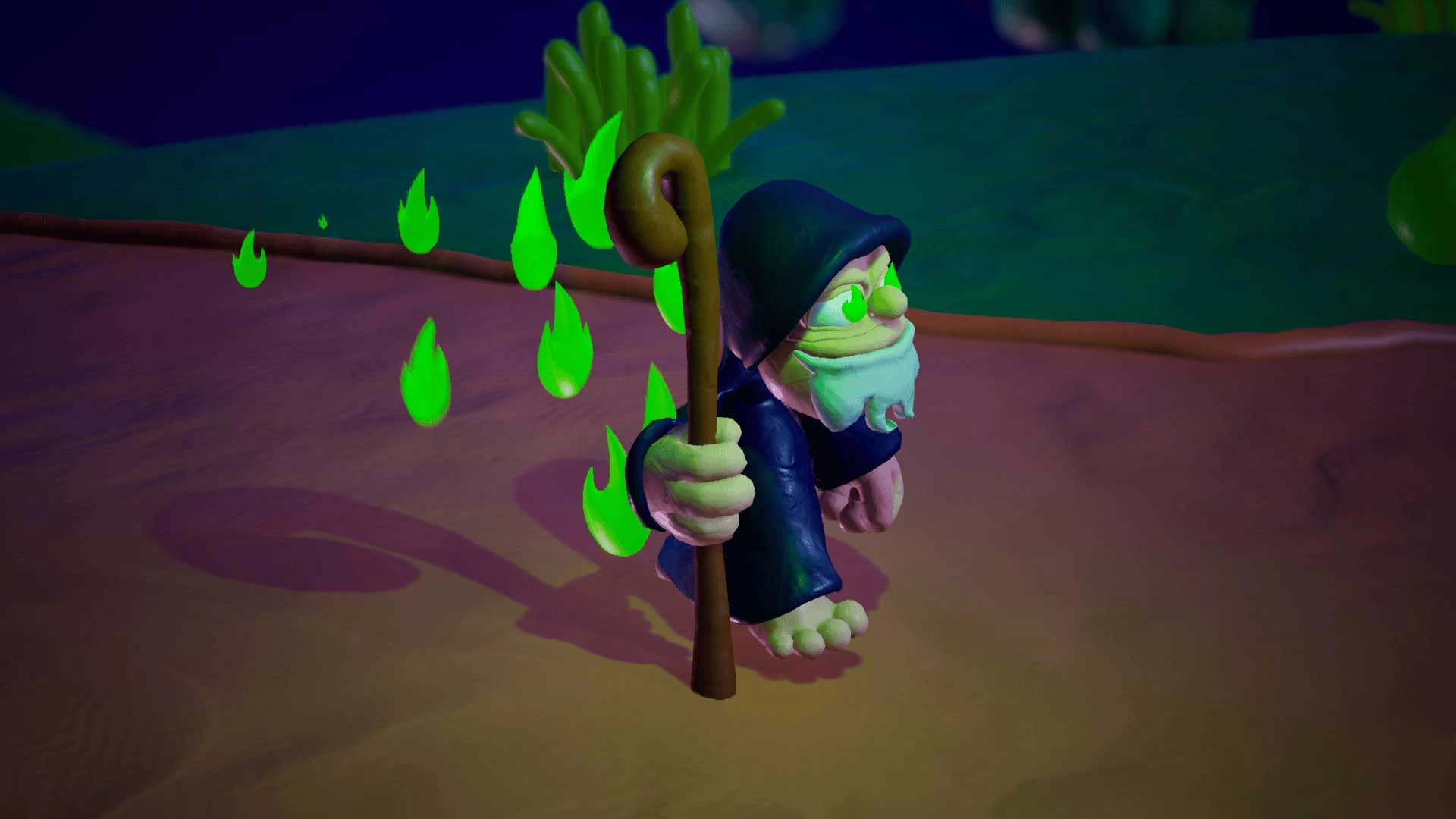Evil wizard Double G with glowing green eyes and staff, standing in a play-dough-style environment