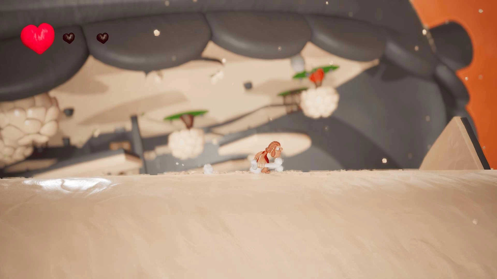 Caveman character running on a play-dough planet surface with floating islands in a multi-gravity world