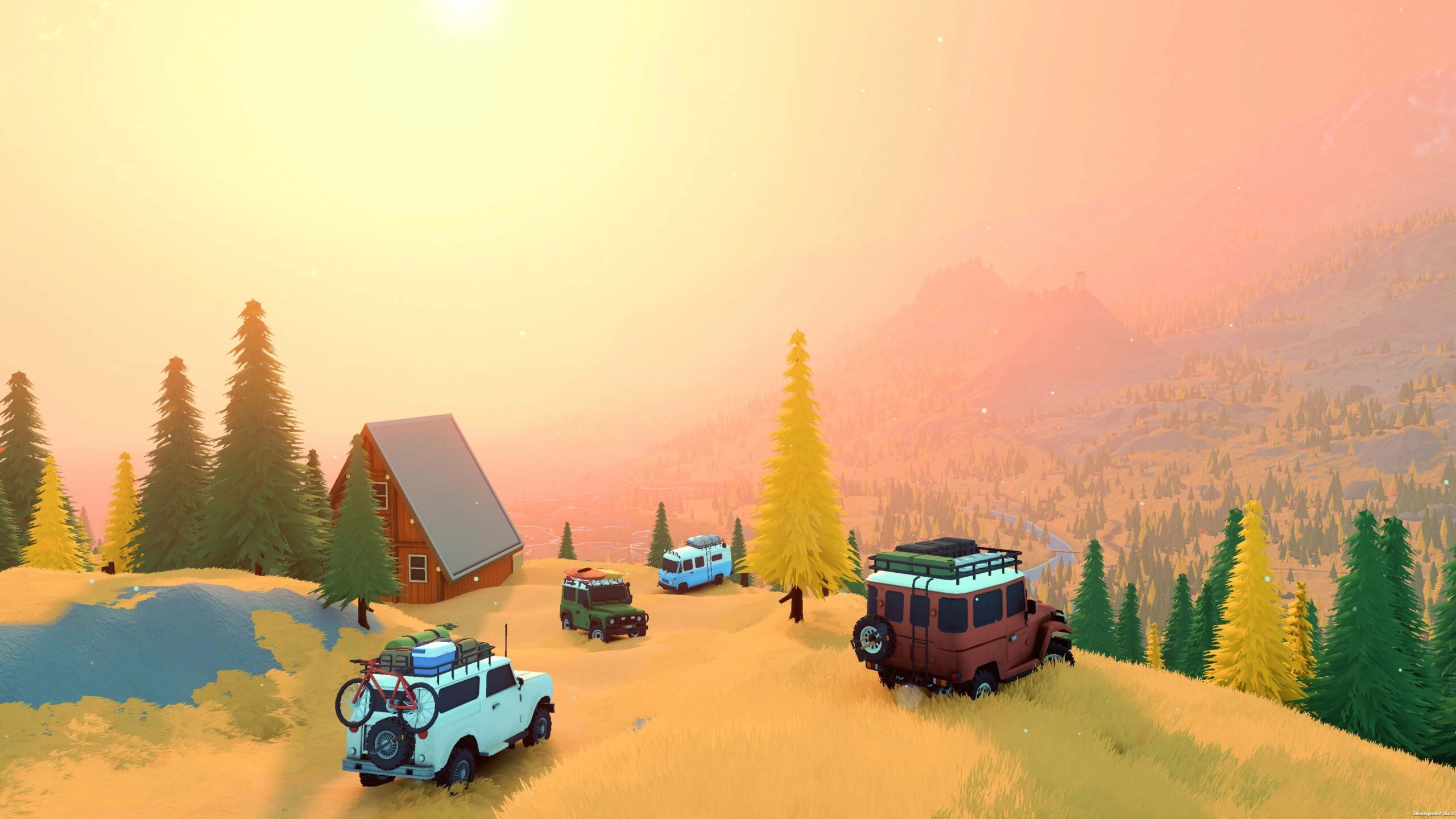 Classic off-road vehicles parked near a cabin in a sunlit, mountainous landscape with pine trees