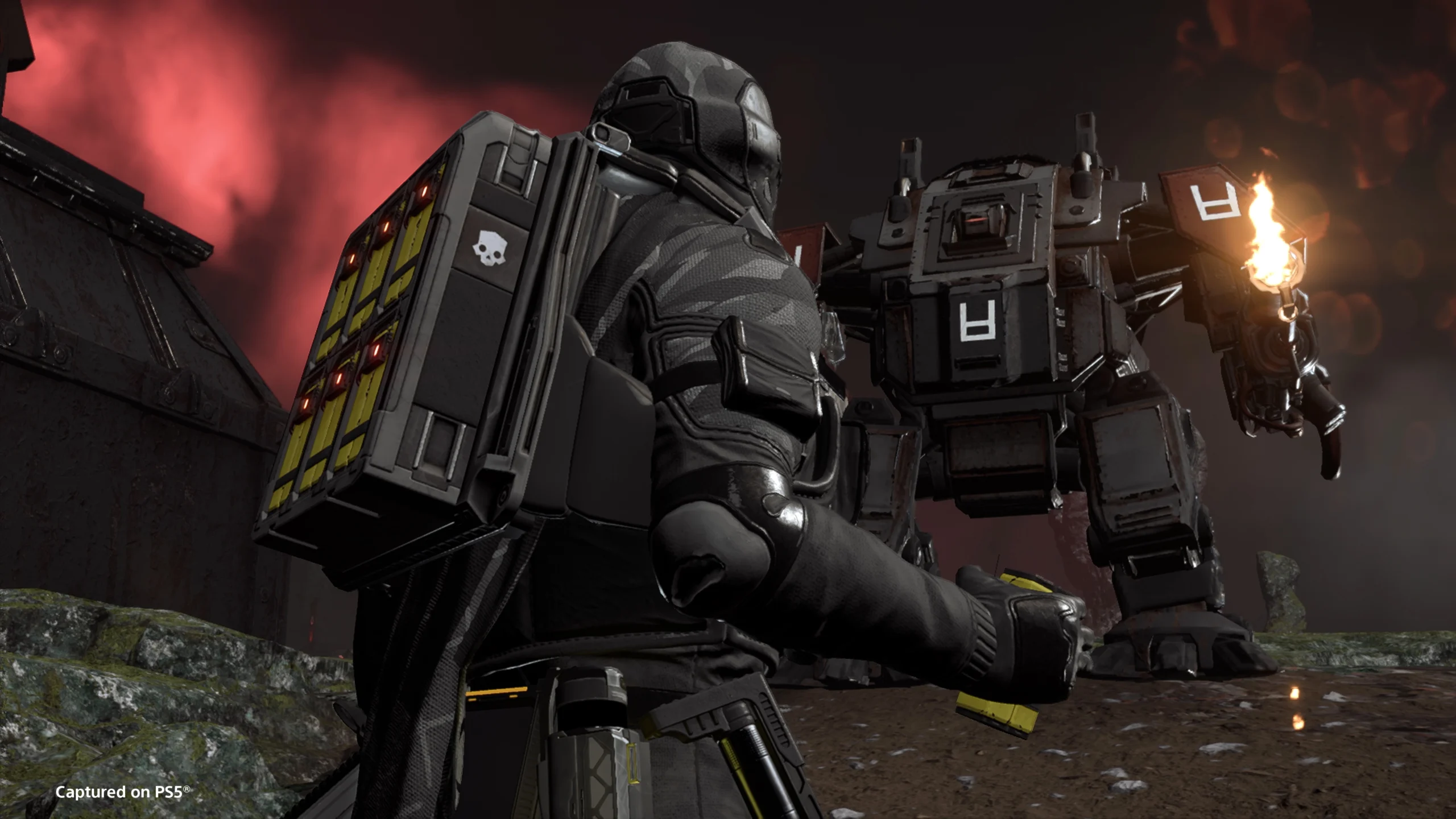 A futuristic soldier with advanced gear faces a mech under a red sky, showcasing the latest in suppression technology.