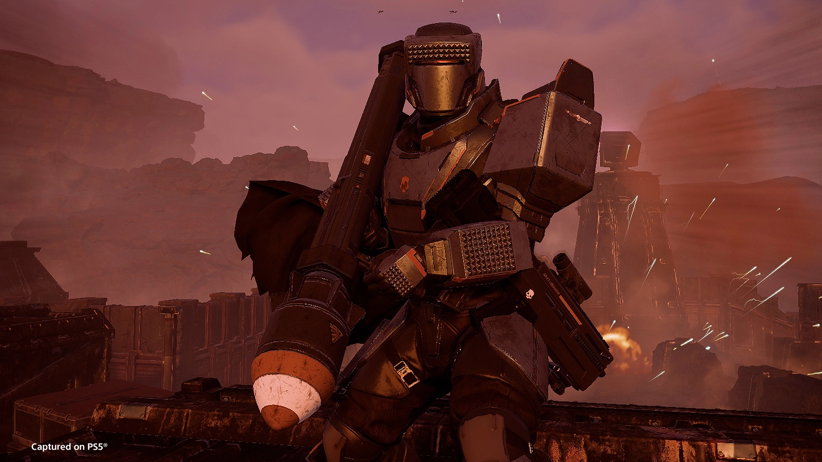 Armored soldier wielding a large missile launcher in a rugged, battle-scarred landscape