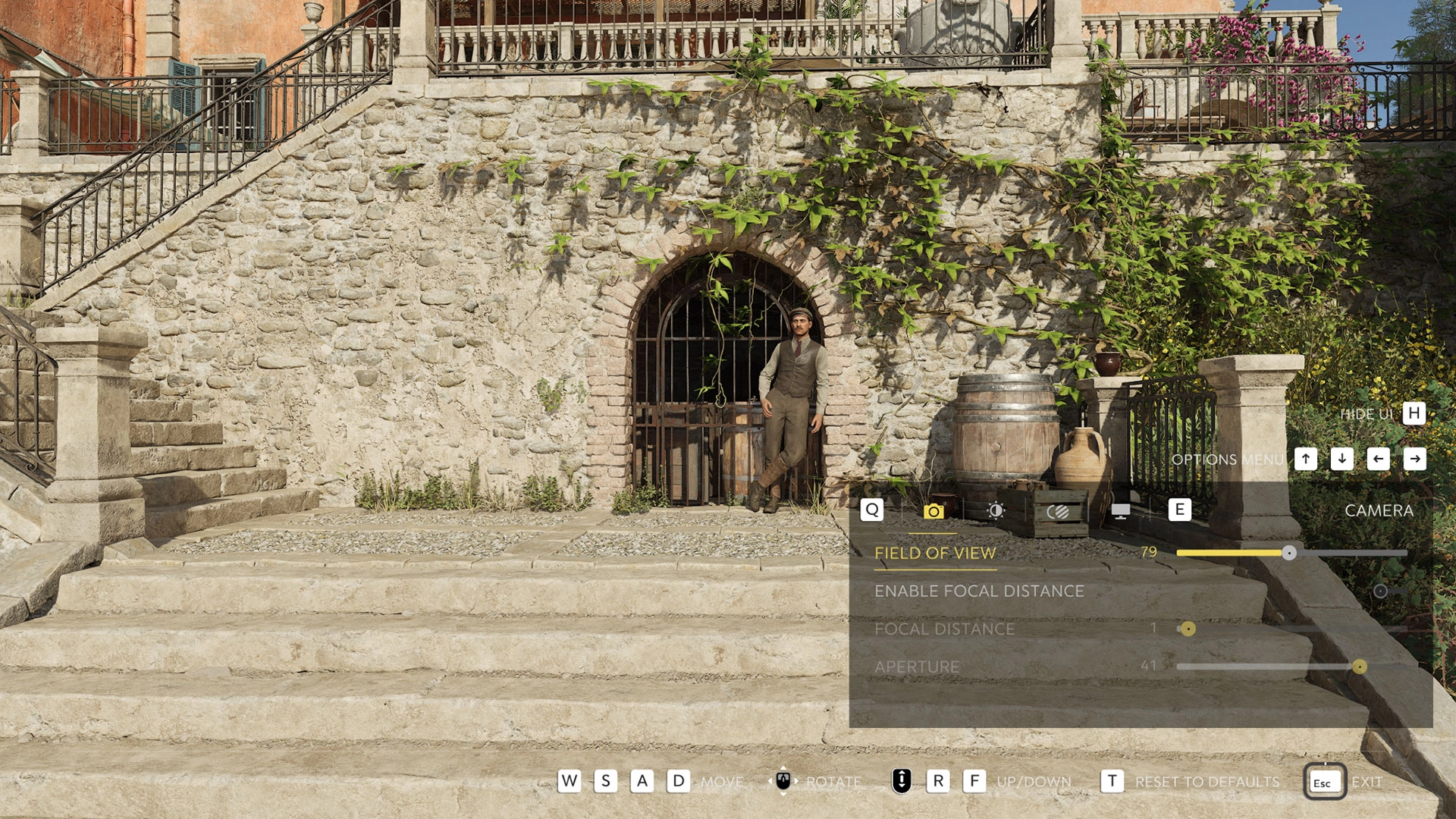 Character standing on stone steps in a Sicilian courtyard, surrounded by rustic architecture and greenery
