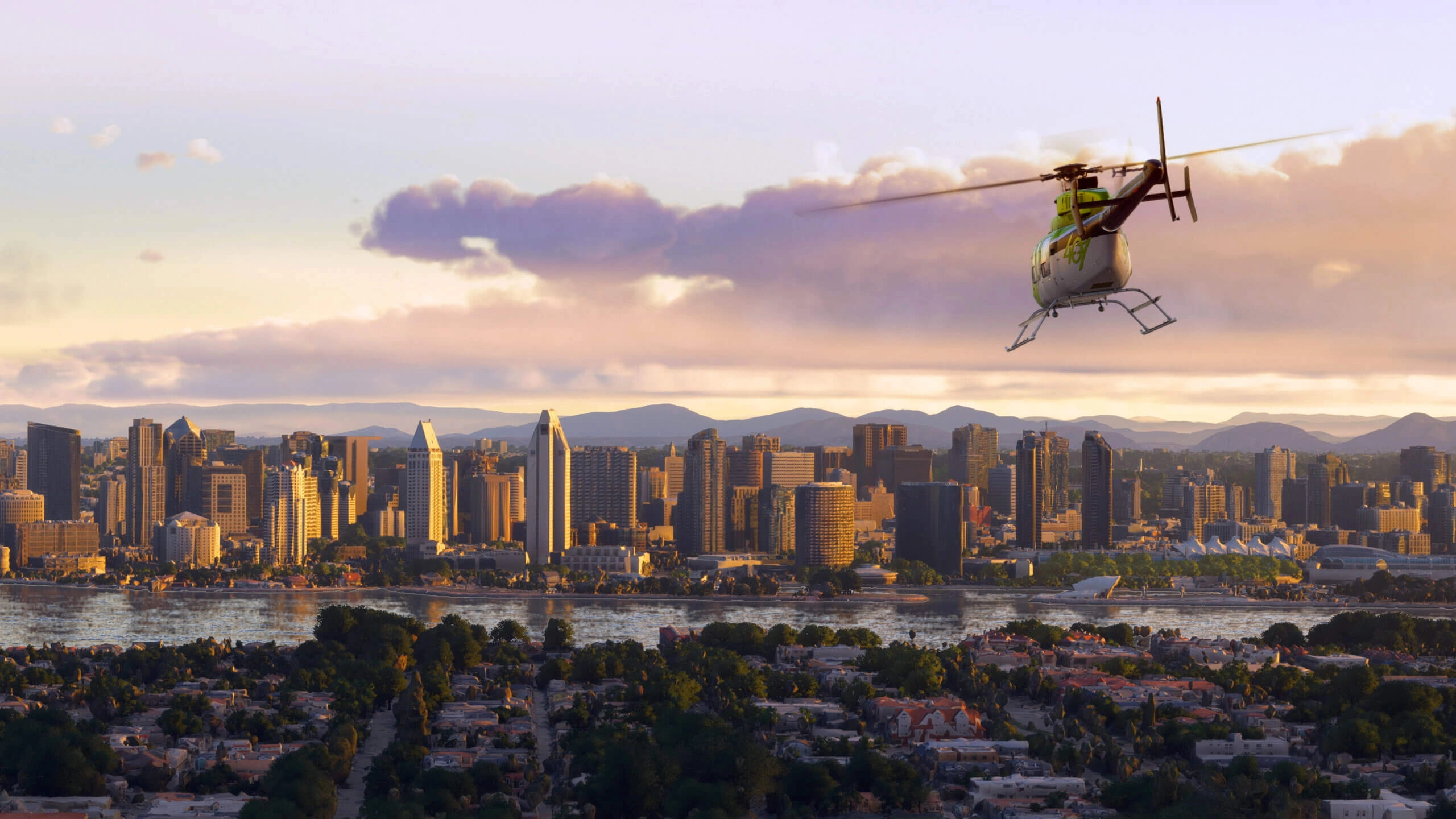 Helicopter flying over San Diego skyline at sunset, showcasing detailed urban landscape in Flight Simulator