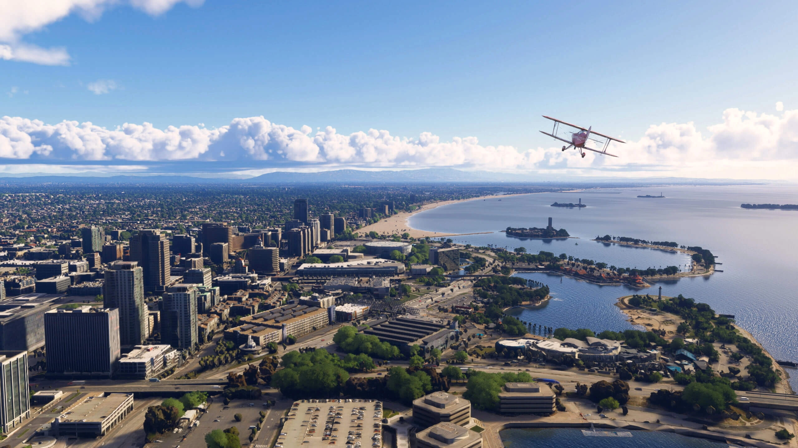 Aerial view of a coastal cityscape with a biplane flying over urban buildings and a scenic shoreline
