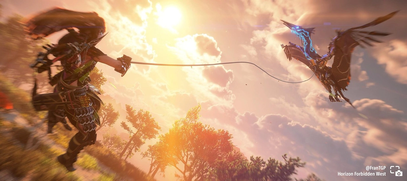 Aloy hooks onto a flying Sunwing in Horizon Forbidden West, set against a vibrant sunset sky