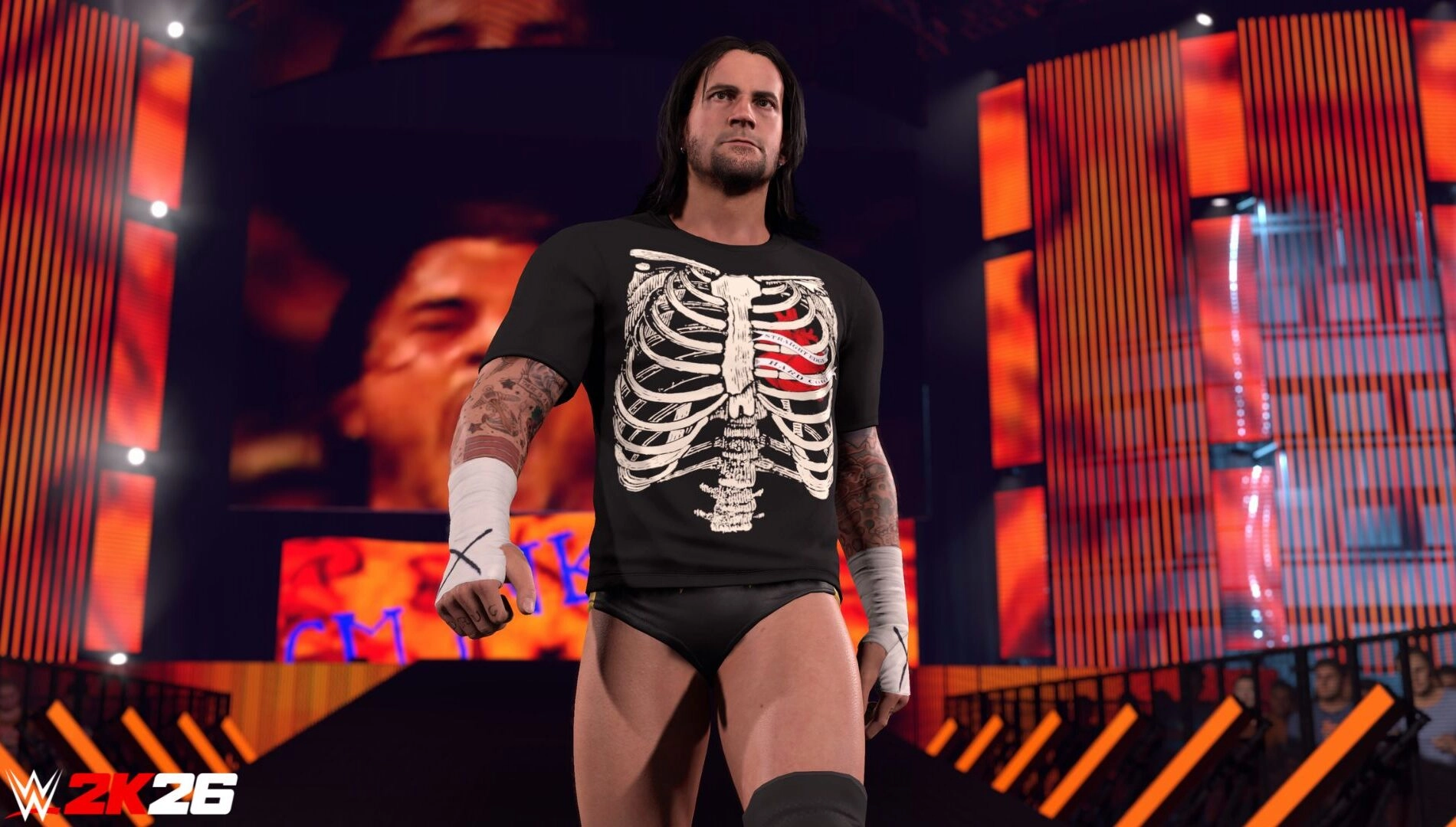 CM Punk enters the WWE 2K26 arena wearing a skeleton shirt, showcasing his iconic wrestling persona