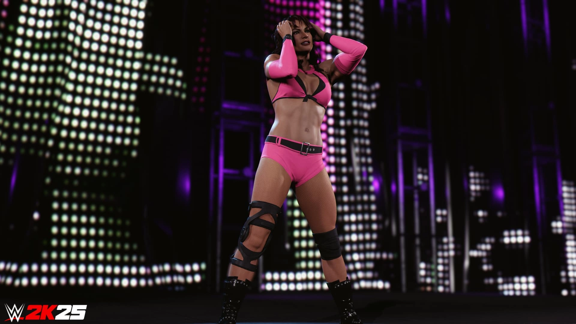 WWE 2K25 character in pink wrestling attire poses confidently in front of a vibrant, illuminated backdrop