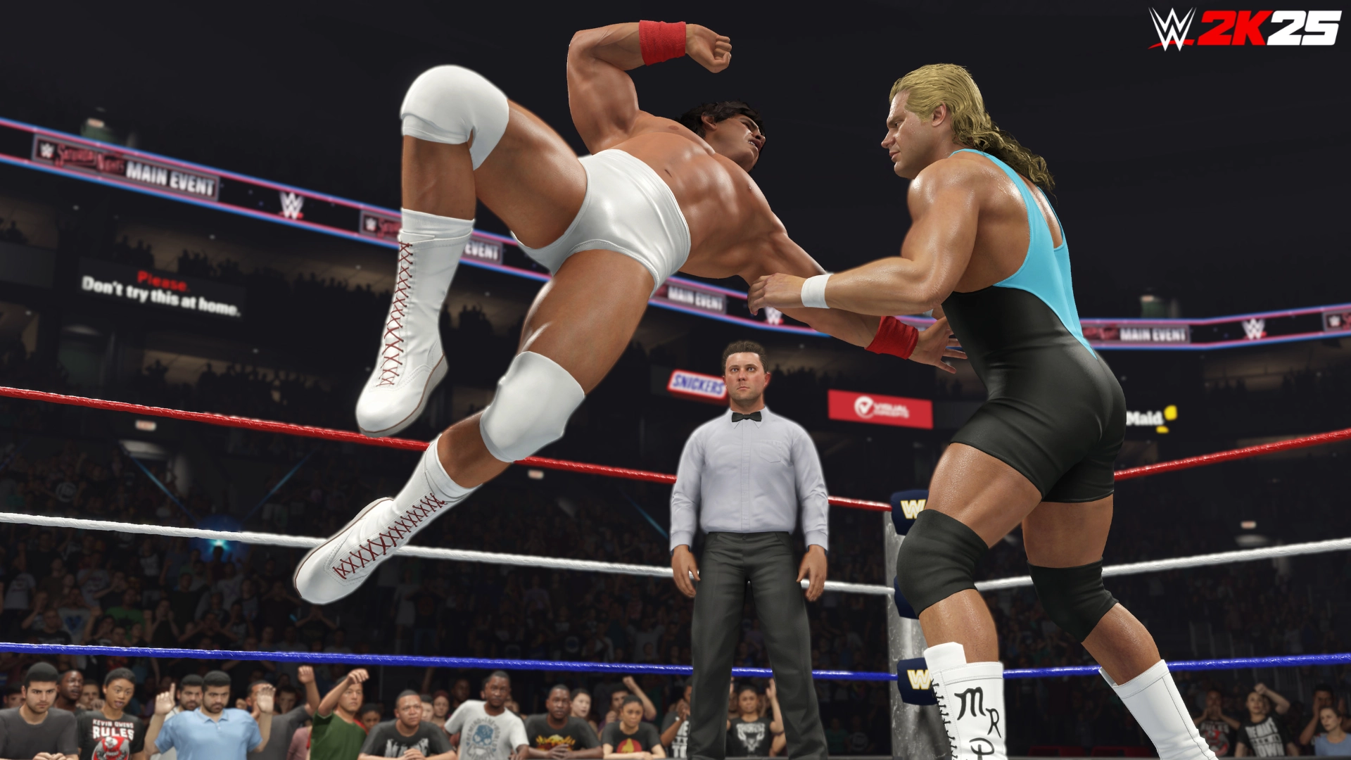Wrestlers in action in WWE 2K25 ring, showcasing dynamic moves and classic wrestling attire