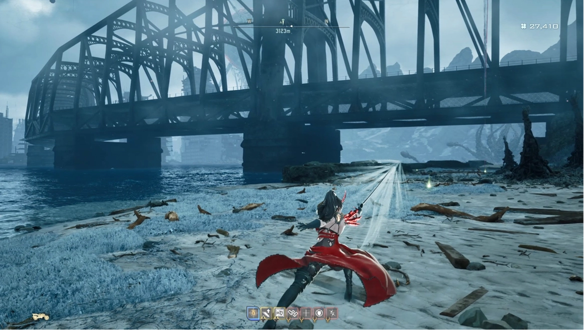 A character in red armor battles on a snowy beach with a large bridge in the background, showcasing combat skills