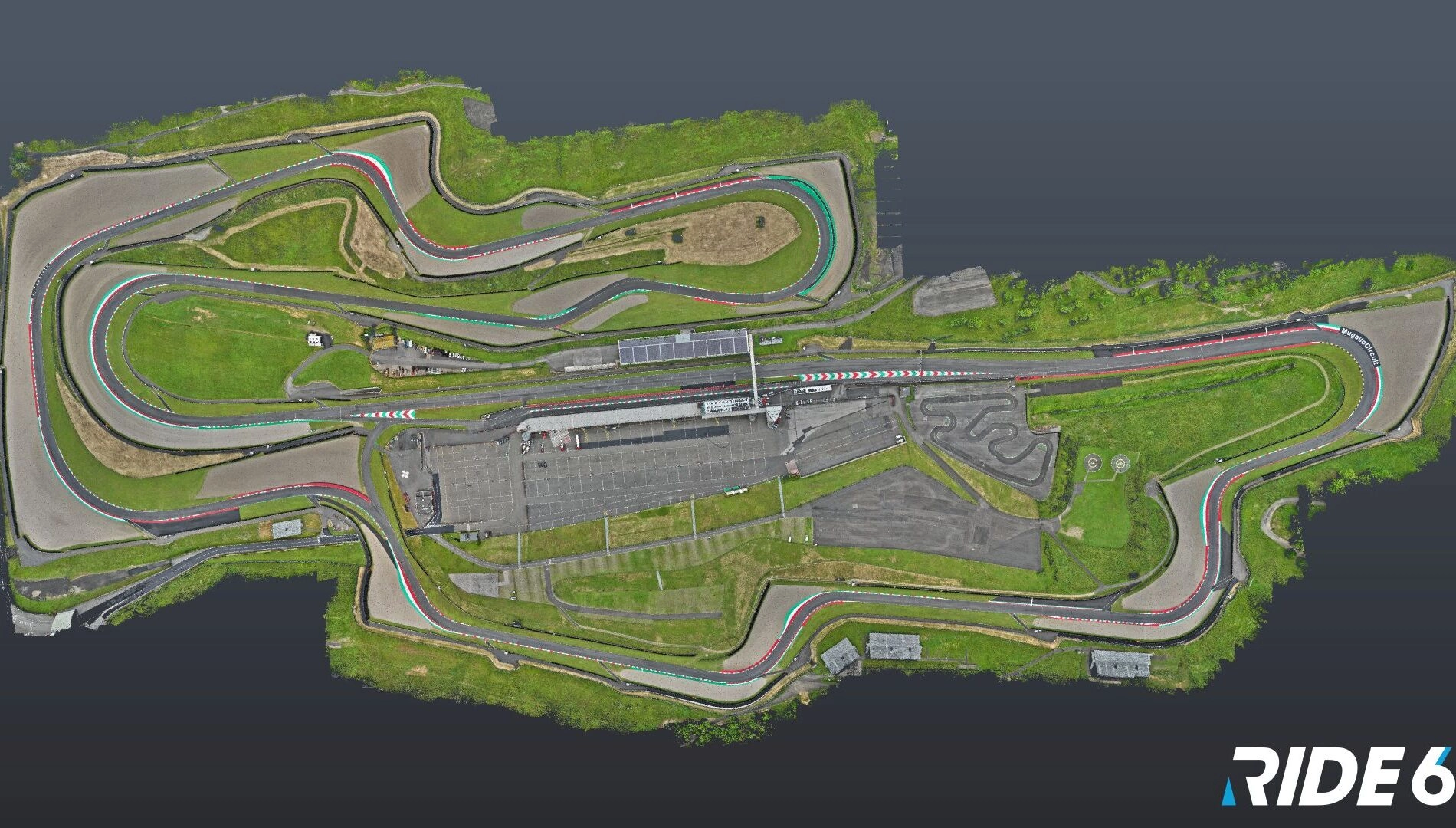 Aerial view of a detailed race track map from Ride 6, showcasing intricate curves and vibrant colors