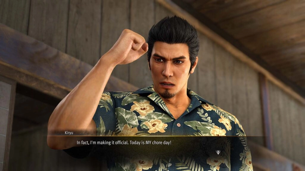 Kiryu in a floral shirt, raising his fist with determination, declares his commitment to chore day