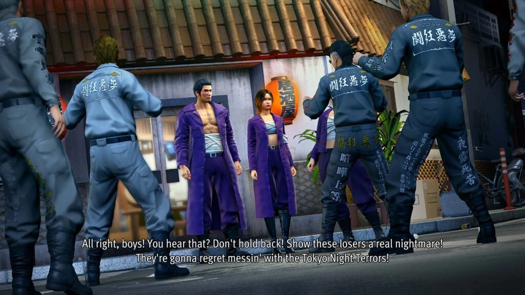 Kiryu and a woman in purple outfits face a group of men in matching uniforms on a street, ready for action