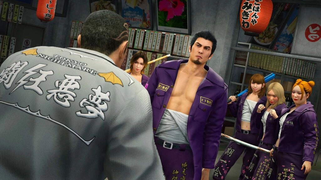 Kiryu confronts a rival gang leader in a tense standoff, surrounded by the Haisai Girls in a bustling street