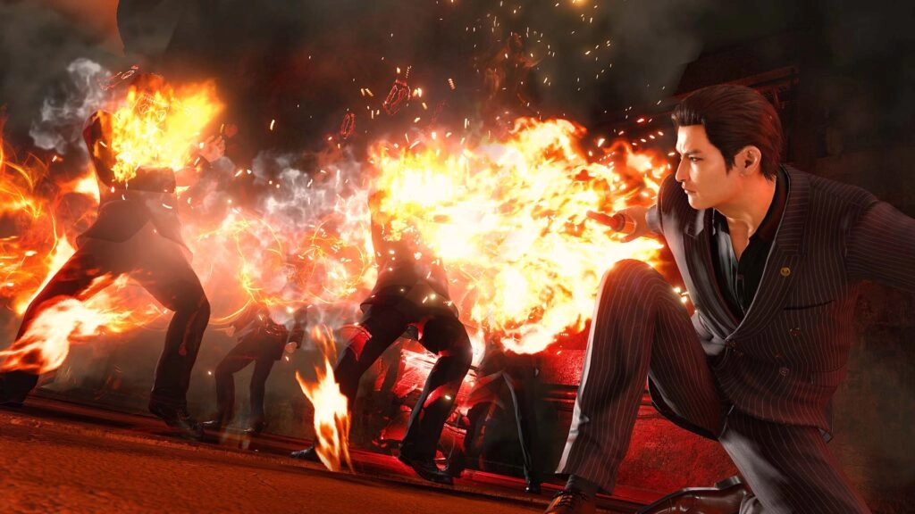 A man in a suit crouches as flames engulf fighters in an intense street battle scene