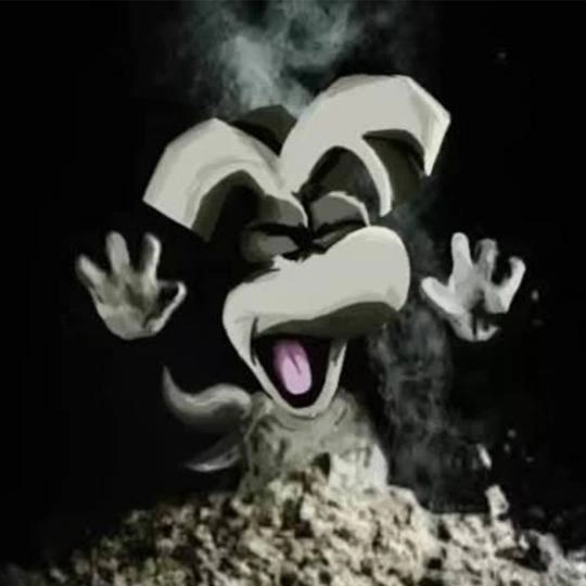 Rayman character emerging from a pile of rubble with a joyful expression, celebrating 30 years of adventures