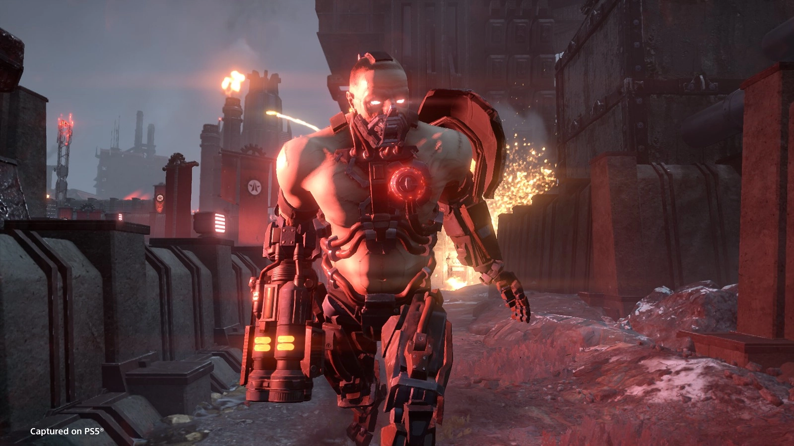 Cyborg soldier advancing through Cyberstan's industrial landscape, glowing red lights and fiery backdrop